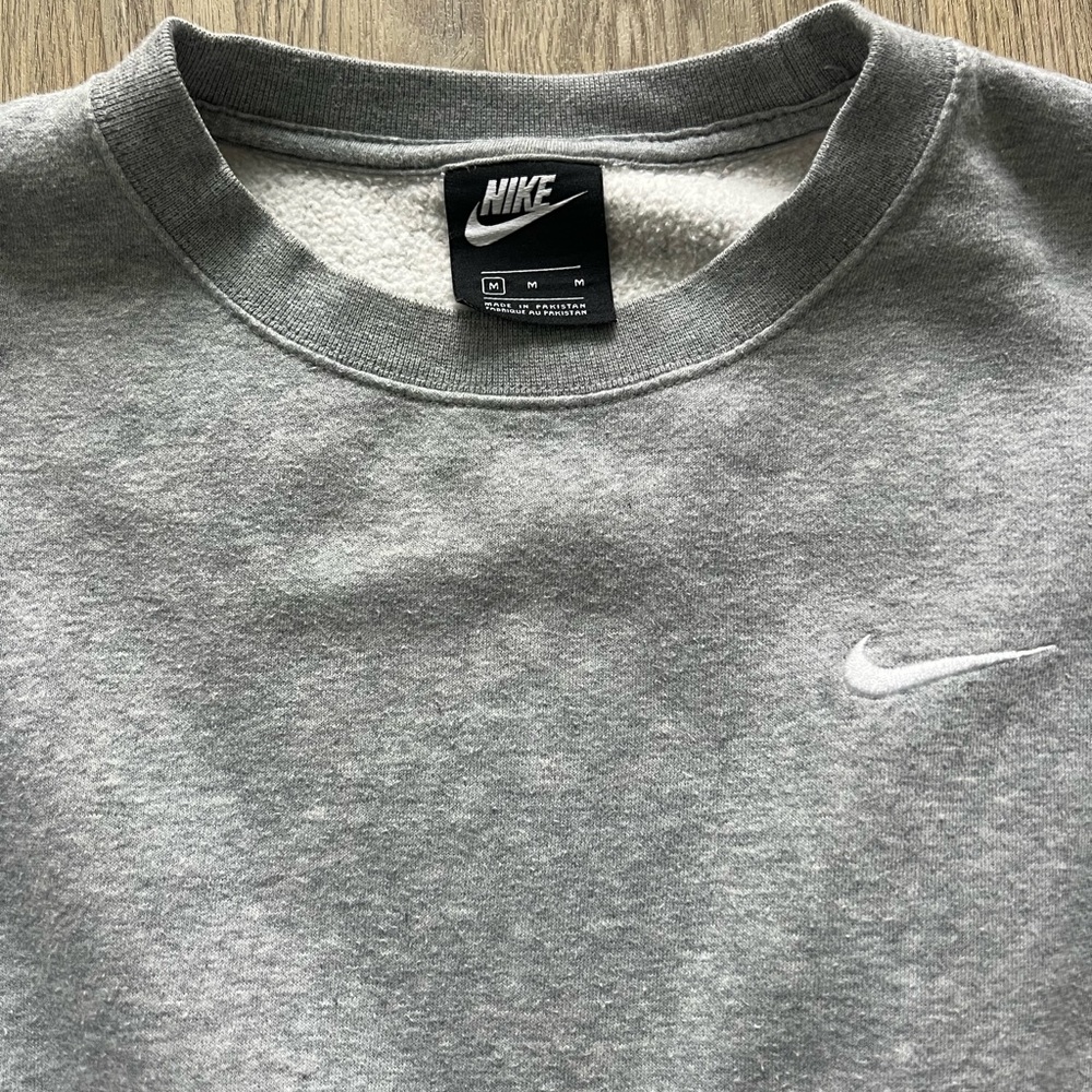 Gray Nike sweatshirt